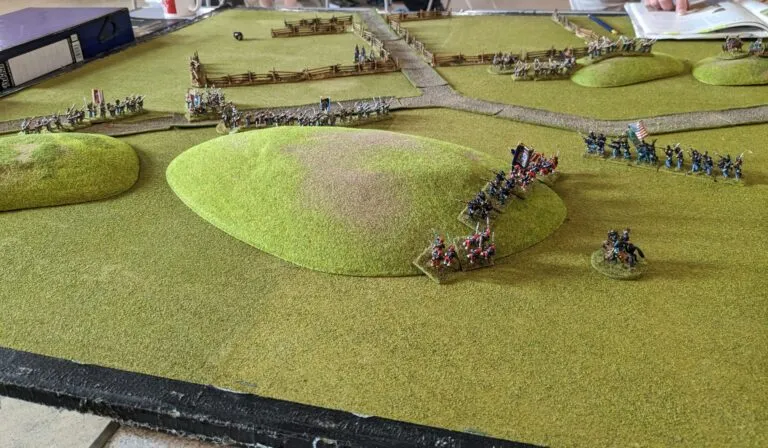 Union brigade advancing up the hill to close with the Confederate left flank