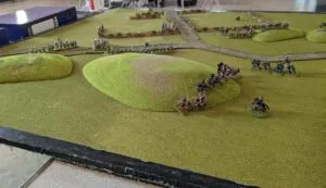 Confederate brigade retreating from the hilltop after losing the close assault to the Union right flank